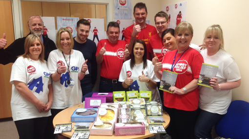 Housing Association contact centre volunteers for Sport Relief host a bake sale
