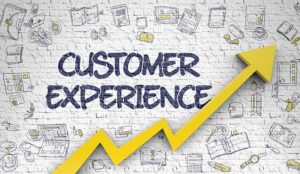 A graphic showing an upwards trend line under the words customer experience