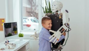 A photo of a boy hugging a robot