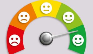 A picture of a dial of emotions with an arrow pointing