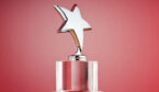 Star award against red gradient background