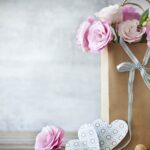 Mothers day concept with gift bag and flowers