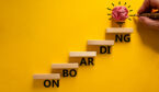 Success onboarding process symbol. Wood blocks stacking as step stair on yellow background