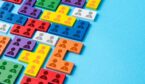 People icons on coloured blocks - workforce and team management concept
