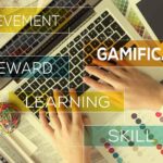Workplace gamification concept with laptop and the words gamification, skill, reward, achievement, and learning