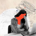 Person sat at desk - employee burnout concept