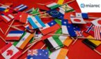 Small flags of different countries in close-up.