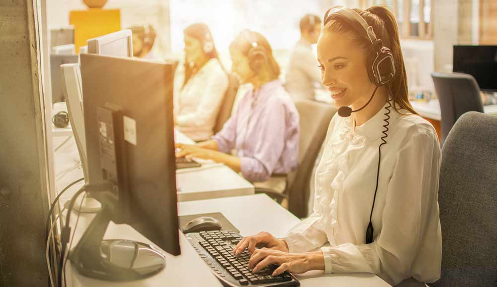 Call centre agents sat at desks