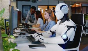 Robot and call centre agents working at a desk.