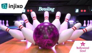 Bowling ball hitting bowling pins