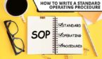 SOP - Standard Operating Procedure, text on notepad and office accessories on yellow desk