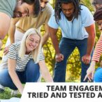 Team engagement activity concept with group of people looking at paper during game