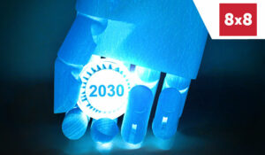 Robot hand holding a 2030 sign