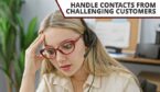 A call centre agent in an office wearing a headset and glasses