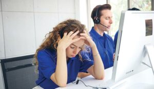 Call centre agent looking stressed