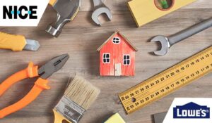 Work tools with a wooden house model.