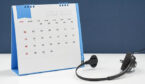 November calendar and call centre headset in office