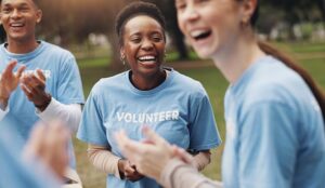 A group of charity volunteers smiling